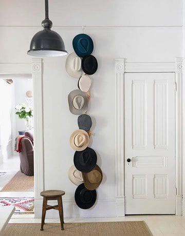 3. ACCENT THE WALL WITH HATS