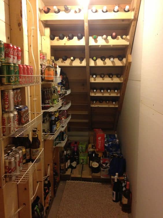 7. Wine and beverage storage under the stairs
