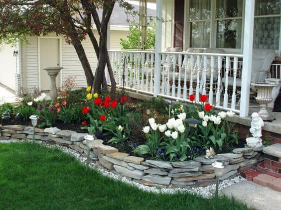 14. STONE SLABS EDGING AND STUNNING FLOWERS