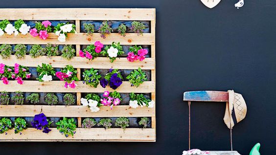 48. COLORFUL PALLET GARDEN IDEA