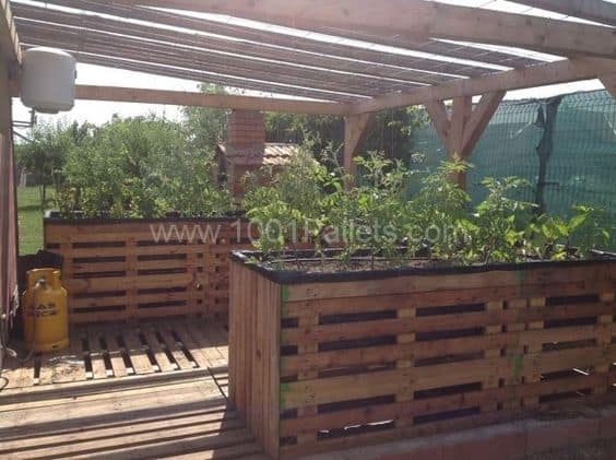 57. ELEVATED PALLET GARDEN PLANTERS