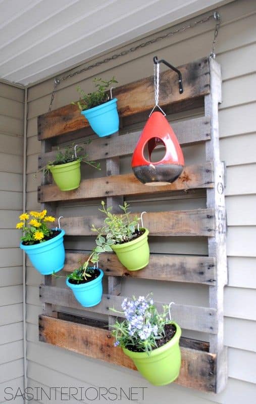 74. PALLET PLANTING WITH COLORFUL POTS AND PLANTS