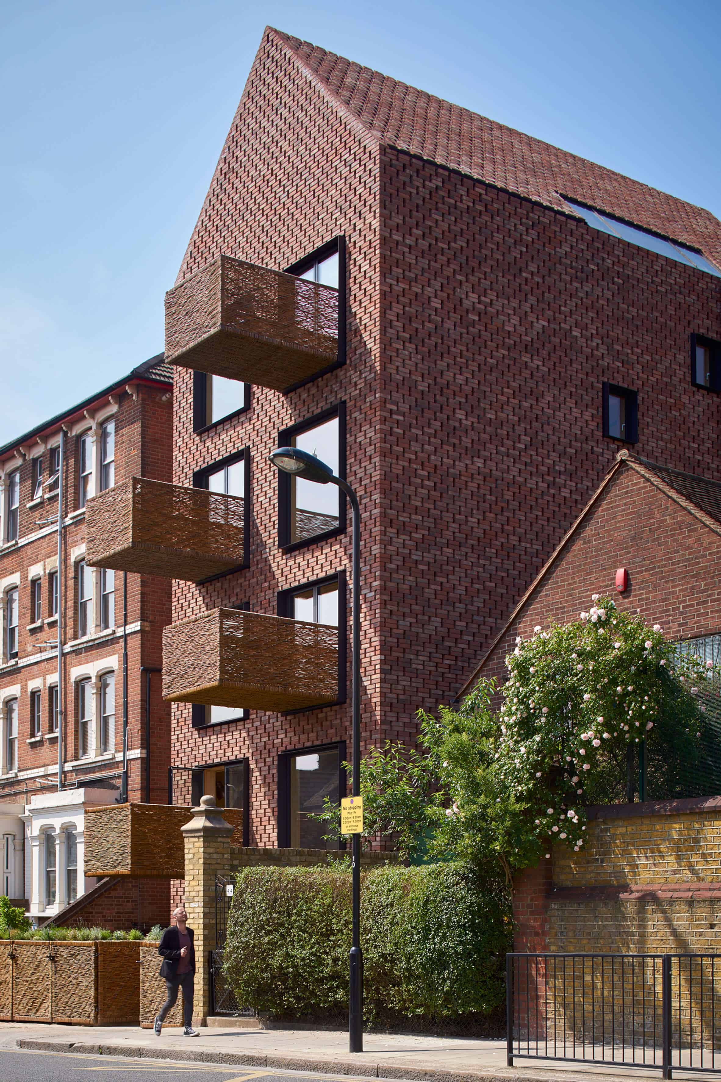 Cross Laminated Timber Wrapped in Brick by Amin Taha Architects 10