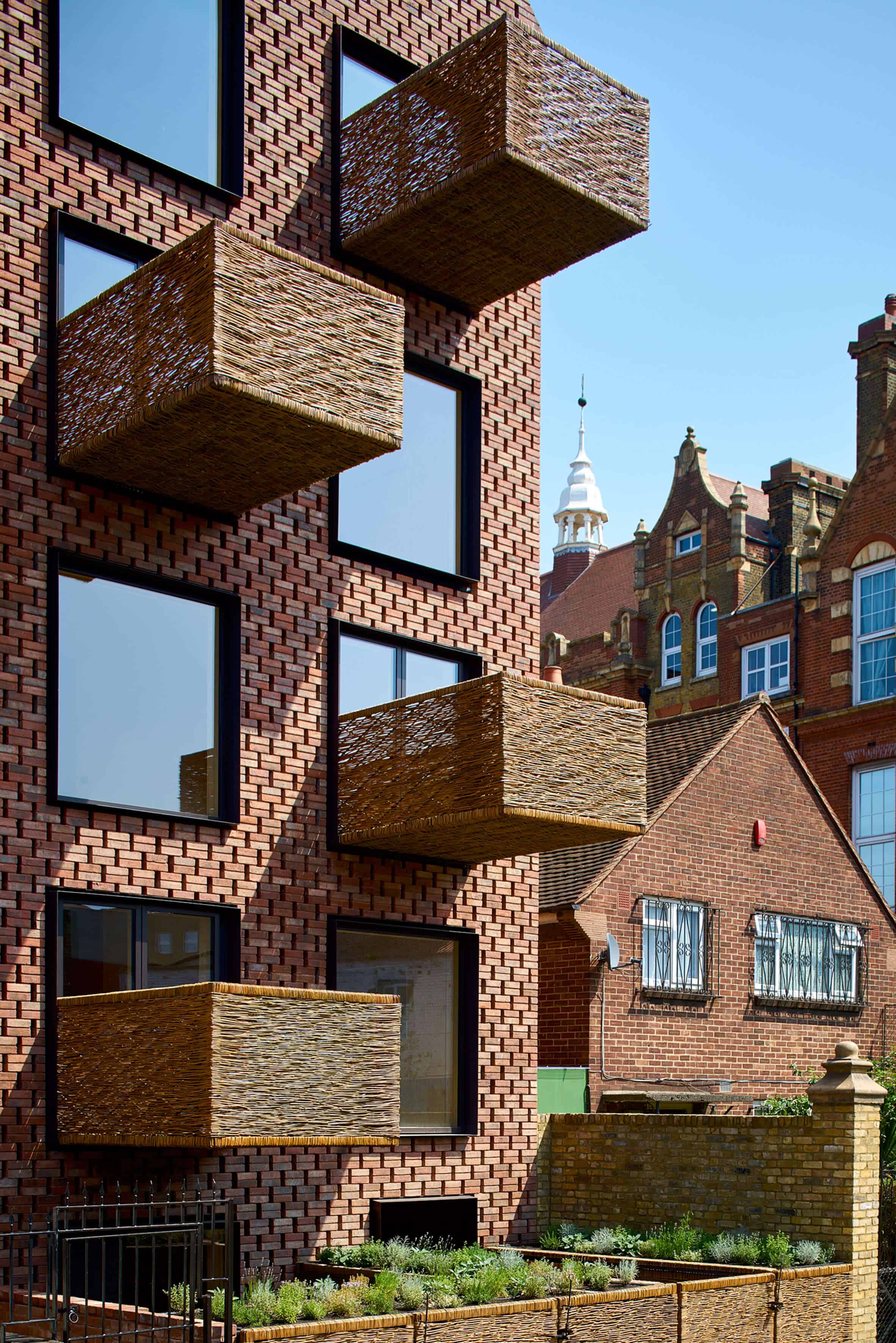 Cross Laminated Timber Wrapped in Brick by Amin Taha Architects 11