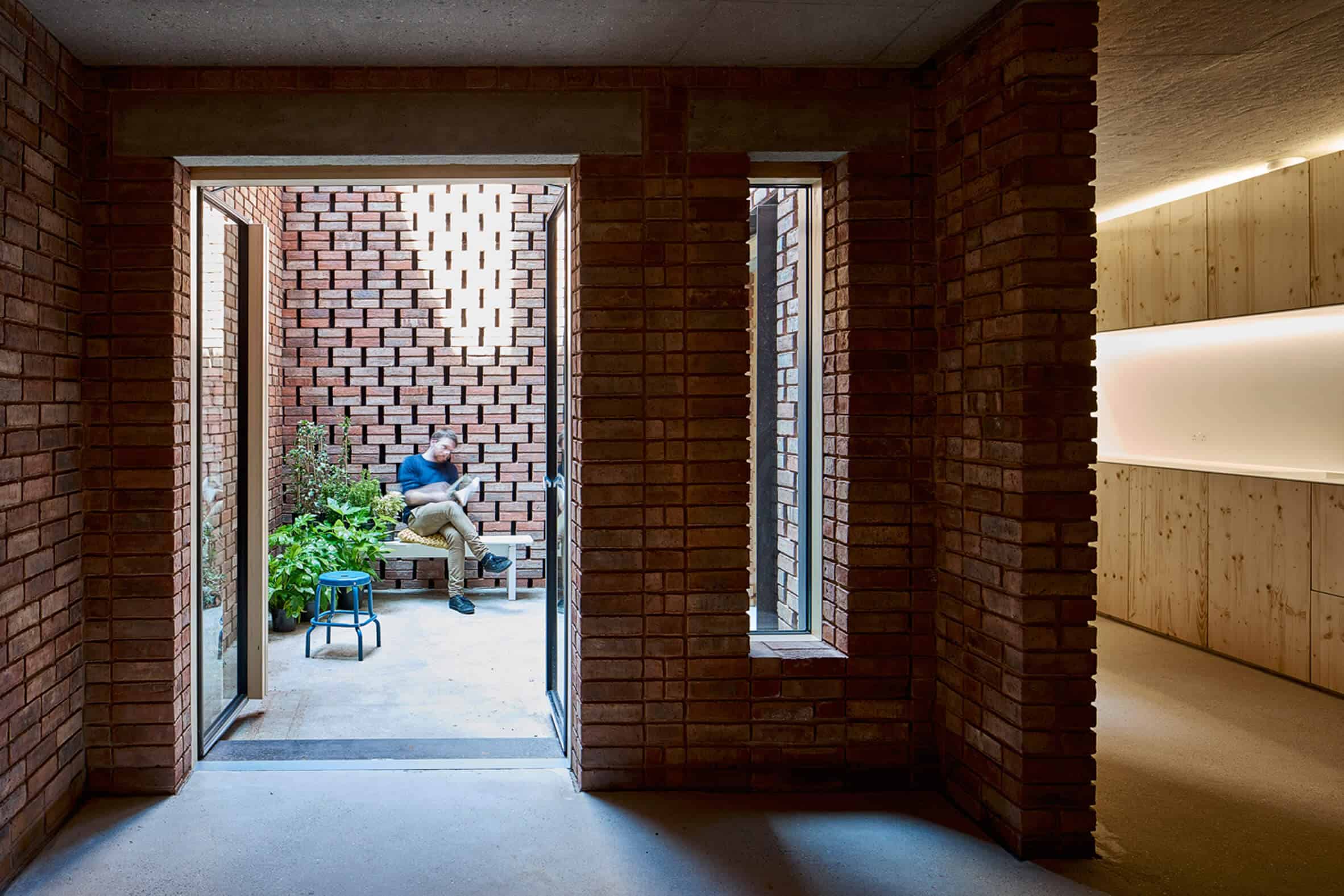 Cross Laminated Timber Wrapped in Brick by Amin Taha Architects 7