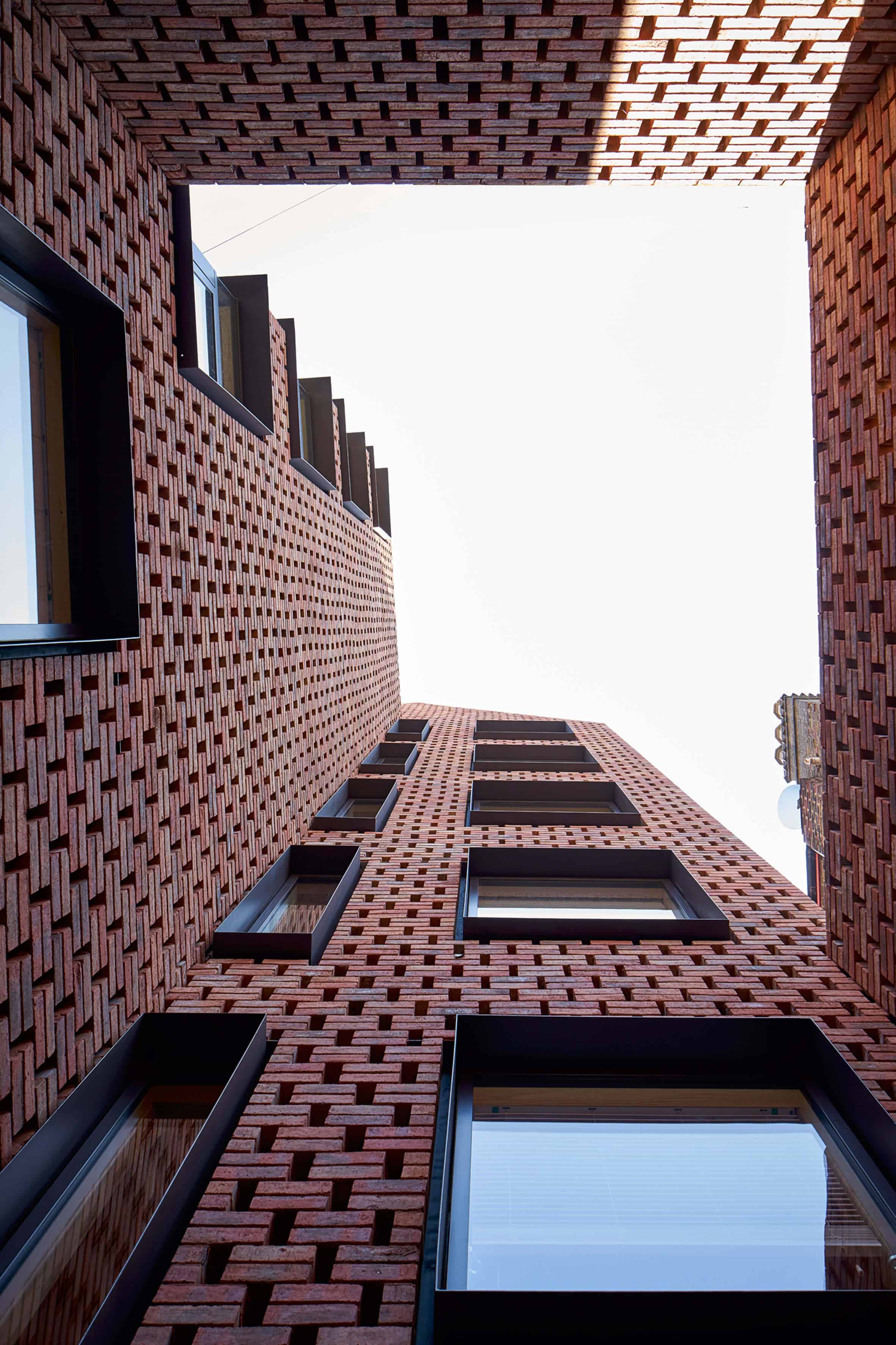 Cross Laminated Timber Wrapped in Brick by Amin Taha Architects 8