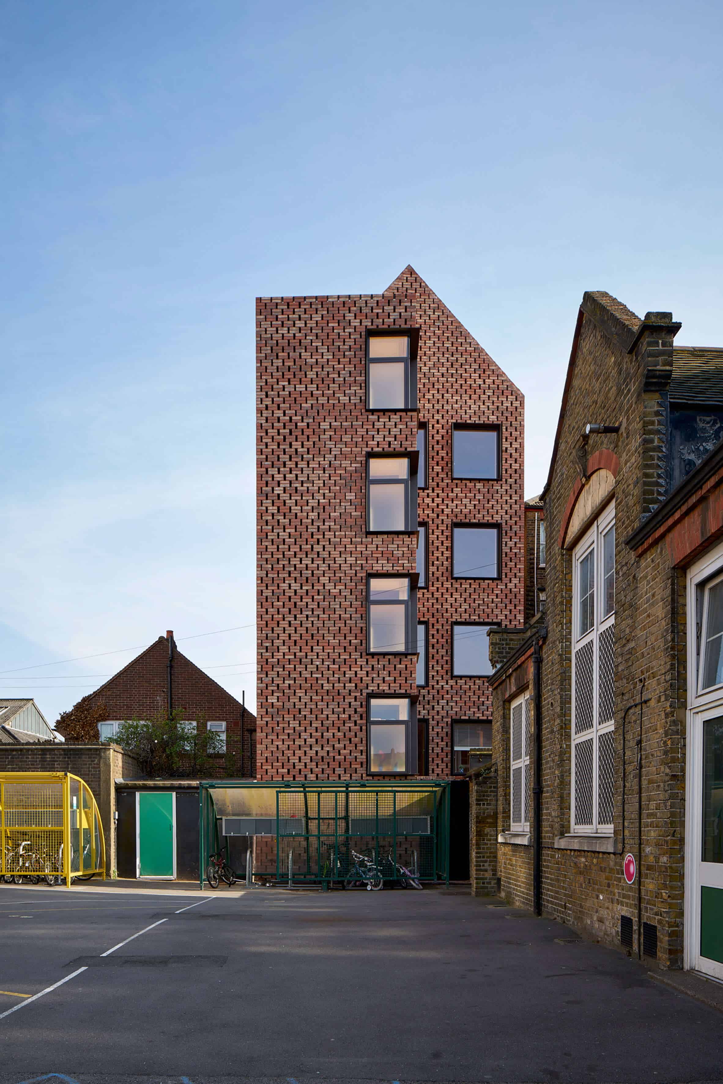 Cross Laminated Timber Wrapped in Brick by Amin Taha Architects 9