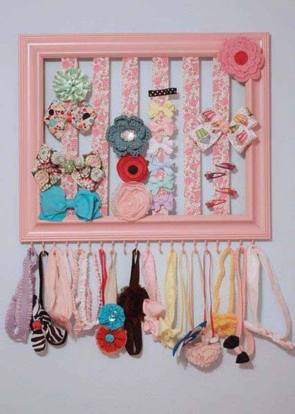 40. FEMININE HAIR CLIPS ORGANIZED IN A PICTURE FRAME