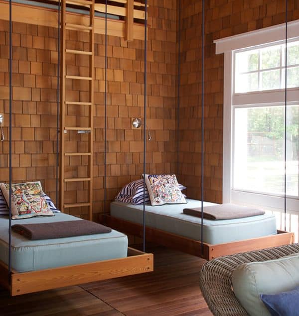 wooden interior design nestles two hanging beds