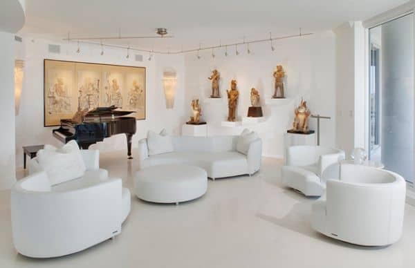 White-contemporary-setting-with-track-lighting-that-brings-in-a-museum-feel