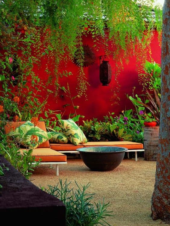 green complementing red accent wall