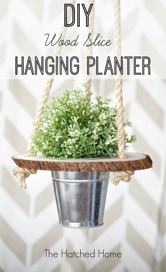 14. DIY WOOD SLICES HANGING PLANTER