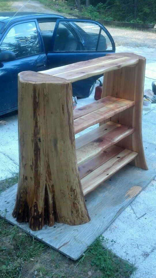 9. RUSTIC LOG BOOKSHELVES 