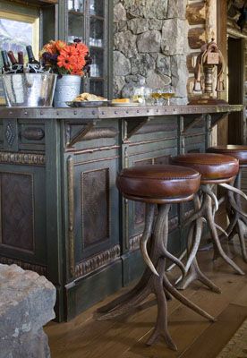 24. A HUNTER'S BAR - ANTLER CHAIR LEGS