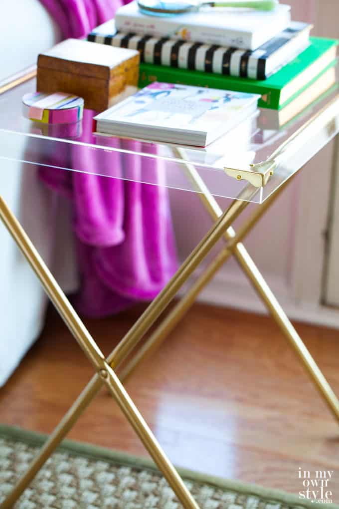 32. ACRYLIC SIDE TABLE WITH X SHAPED METAL LEGS