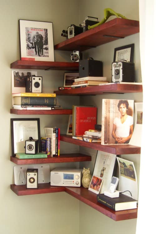 5. Make use of those empty corners by installing corner shelves for extra storage and display capabilities
