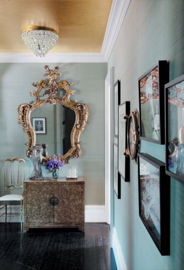 teal walls with golden coved ceilings