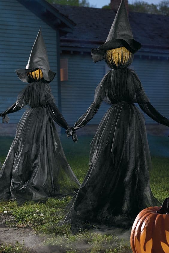 128. WITCHES HOLDING HANDS