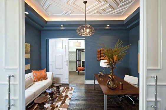lighted coved ceilings in white on blue walls