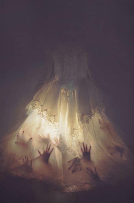 129. CREEPY HANDS IN A WEDDING GOWN
