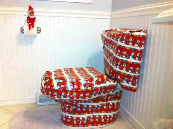 99. Elfie Gift wraps the Commode
