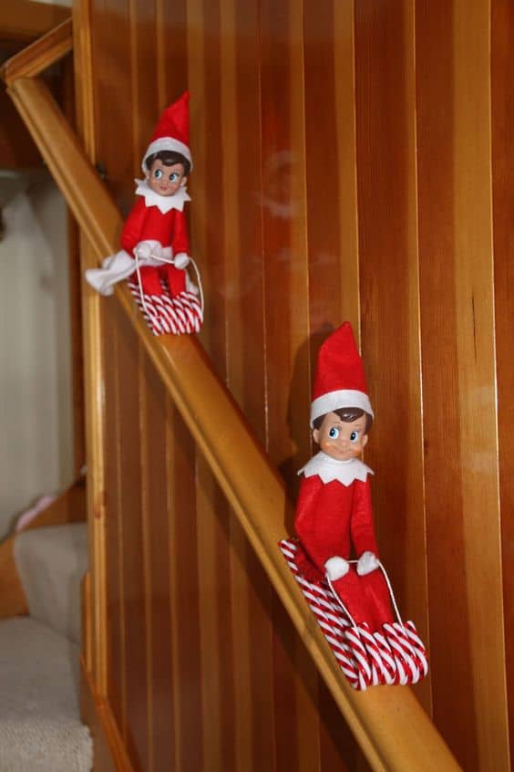 5. Elf on the Shelf Ideas Elfie Cruising on his Candy Cane Sled