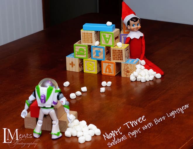 51. Elfie and Buzz Lightyear have a Snowball Fight