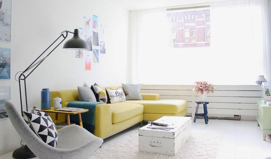 Minimalist clean design with yellow sofa