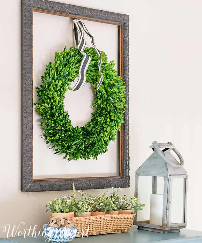 hang a wreath from the inside of an old frame