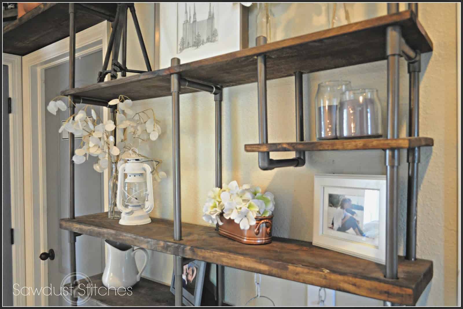 use PVC pipe to build an inexpensive industrial style shelf Sawdust 2 Stitches on Remodelaholic