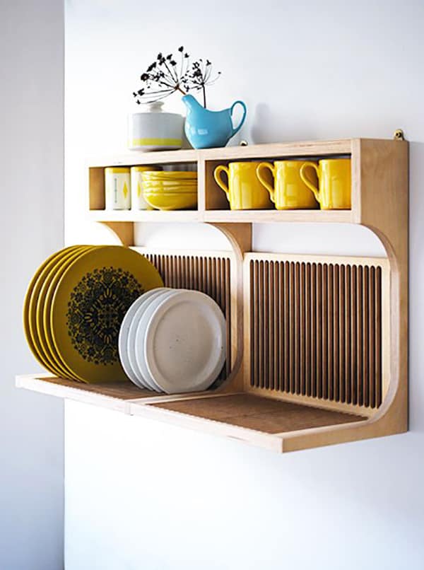 wooden dish drying rack in the wall