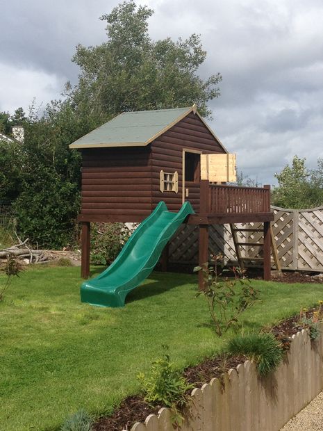 THE PLAYHOUSE WITH A SLIDE