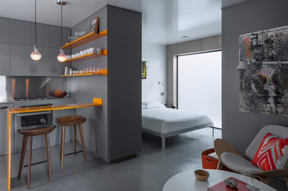 gray micro apartment with little to no compartmentalization 