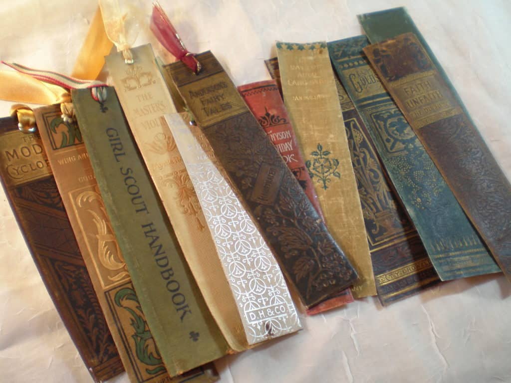 USE SPINES OF THE BOOKS AS BOOKMARKS