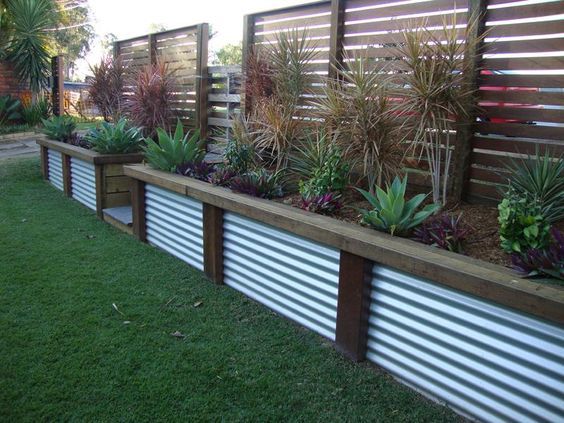 11. Use Steel Panels as a Garden Edge