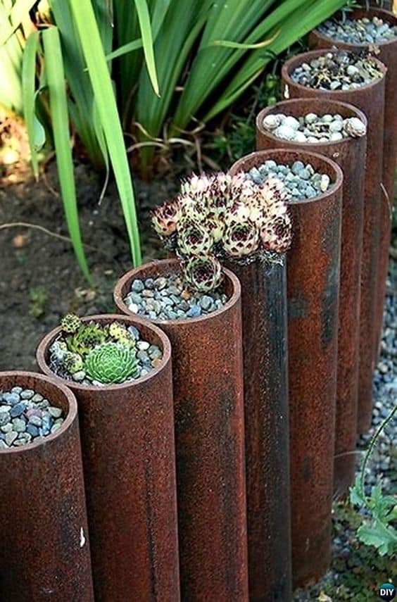 52. Up-cycle Metal Pipe Garden Edges