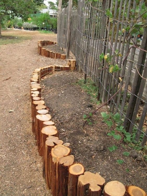 47. Use a Wooden Log Garden Edge
