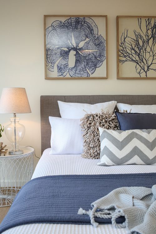 24. Balanced Bedroom With Navy Blue Accents
