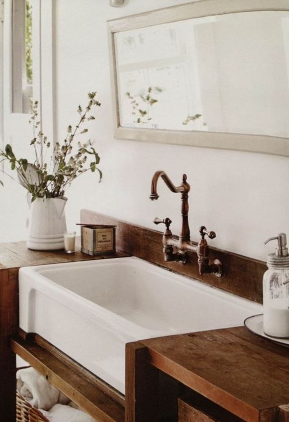 27. White Sink Submerged In Bathroom Wooden Counter