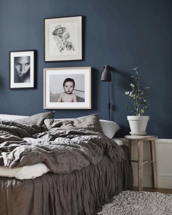 33. Earthy Tones in Blue Bedroom