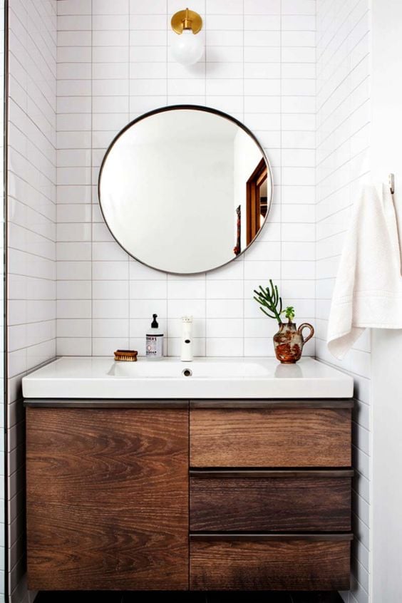 31. White Bathroom Receives Wooden Vanity