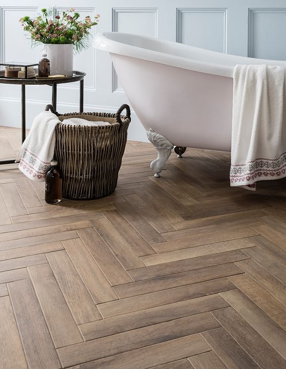 4. Herringbone Patterned Wooden Floor for Bathrooms