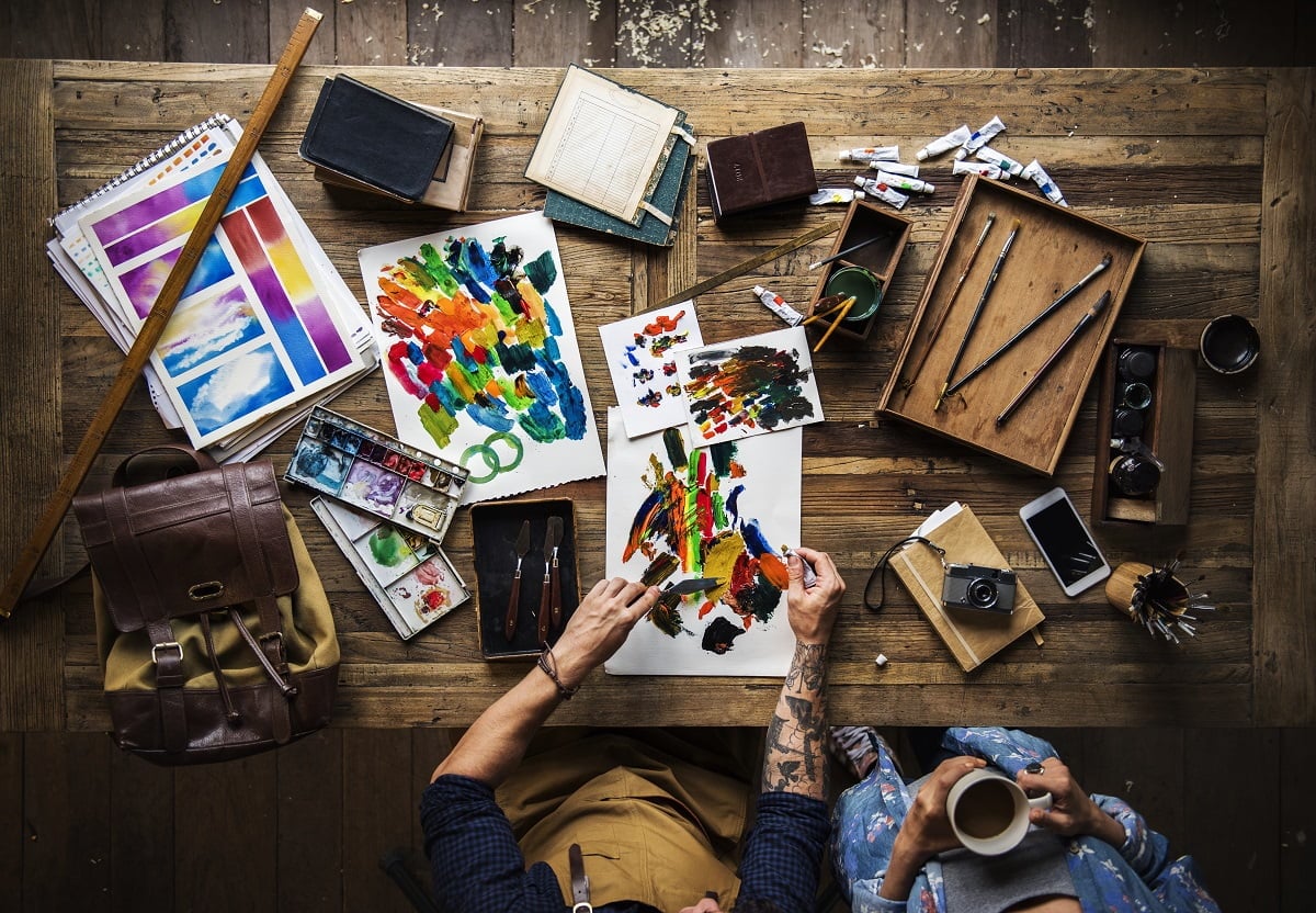 Artist drawing with acrylic paint