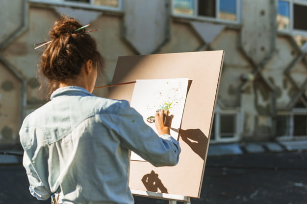 woman painting outdoors En Plein Air watercolor painting23 2148014106
