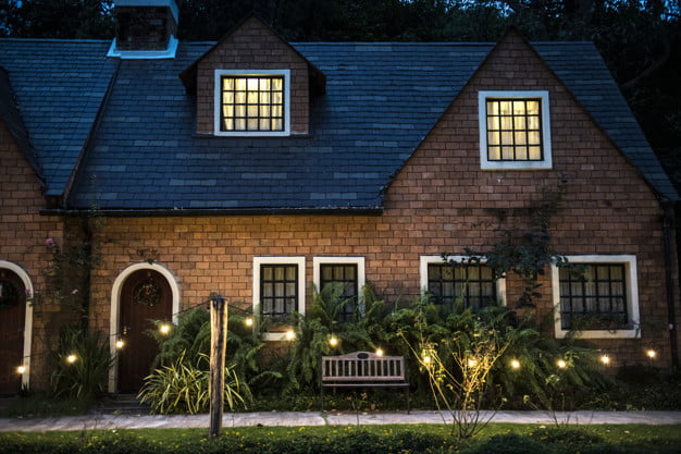 beautiful red brick house with decorative lights 53876 49372