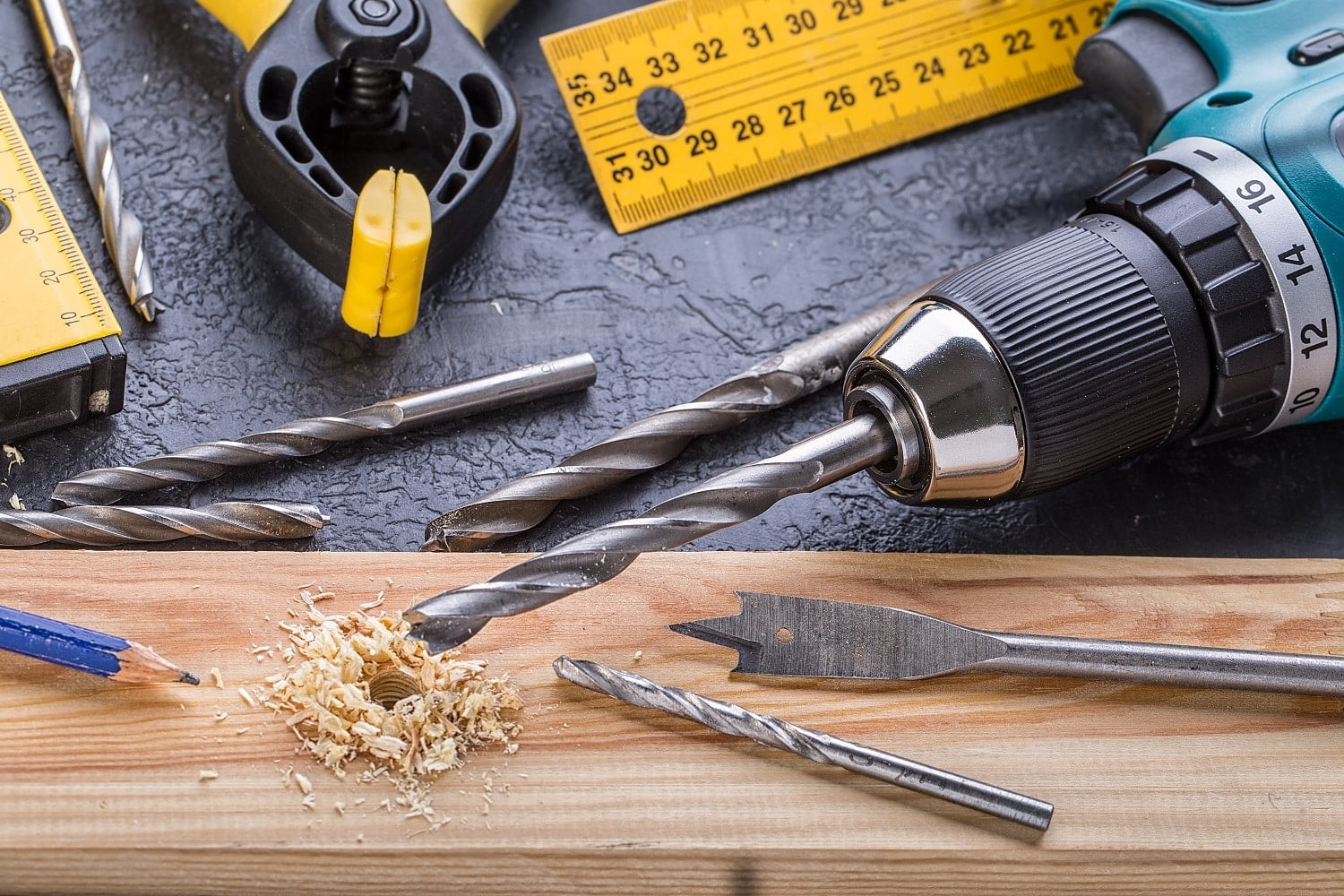 Working Tool on a Wooden Background. Set of carpenter's tools on wooden table