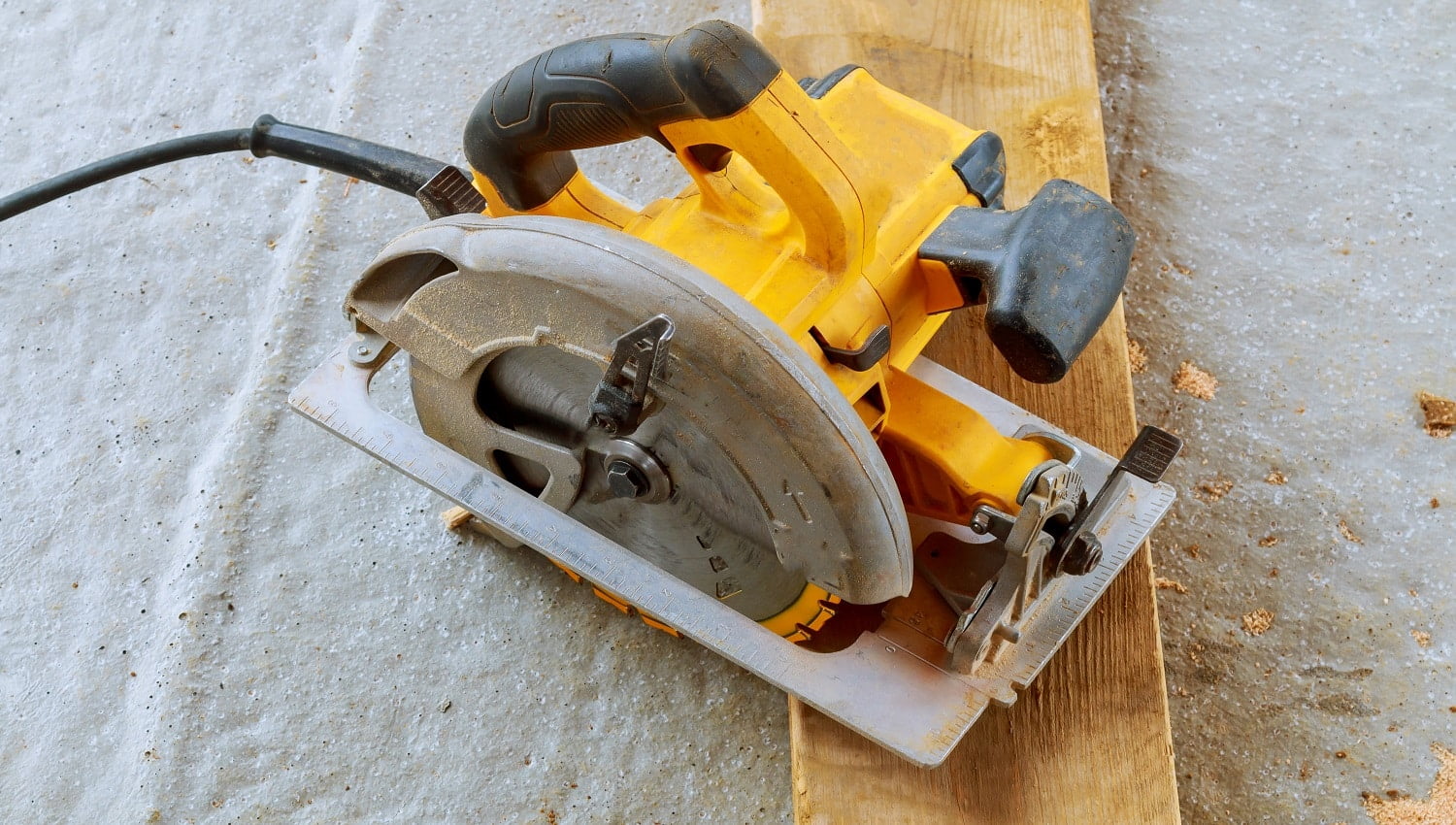 Close up electric circular saw cutting wood Wood cutting with circular saw