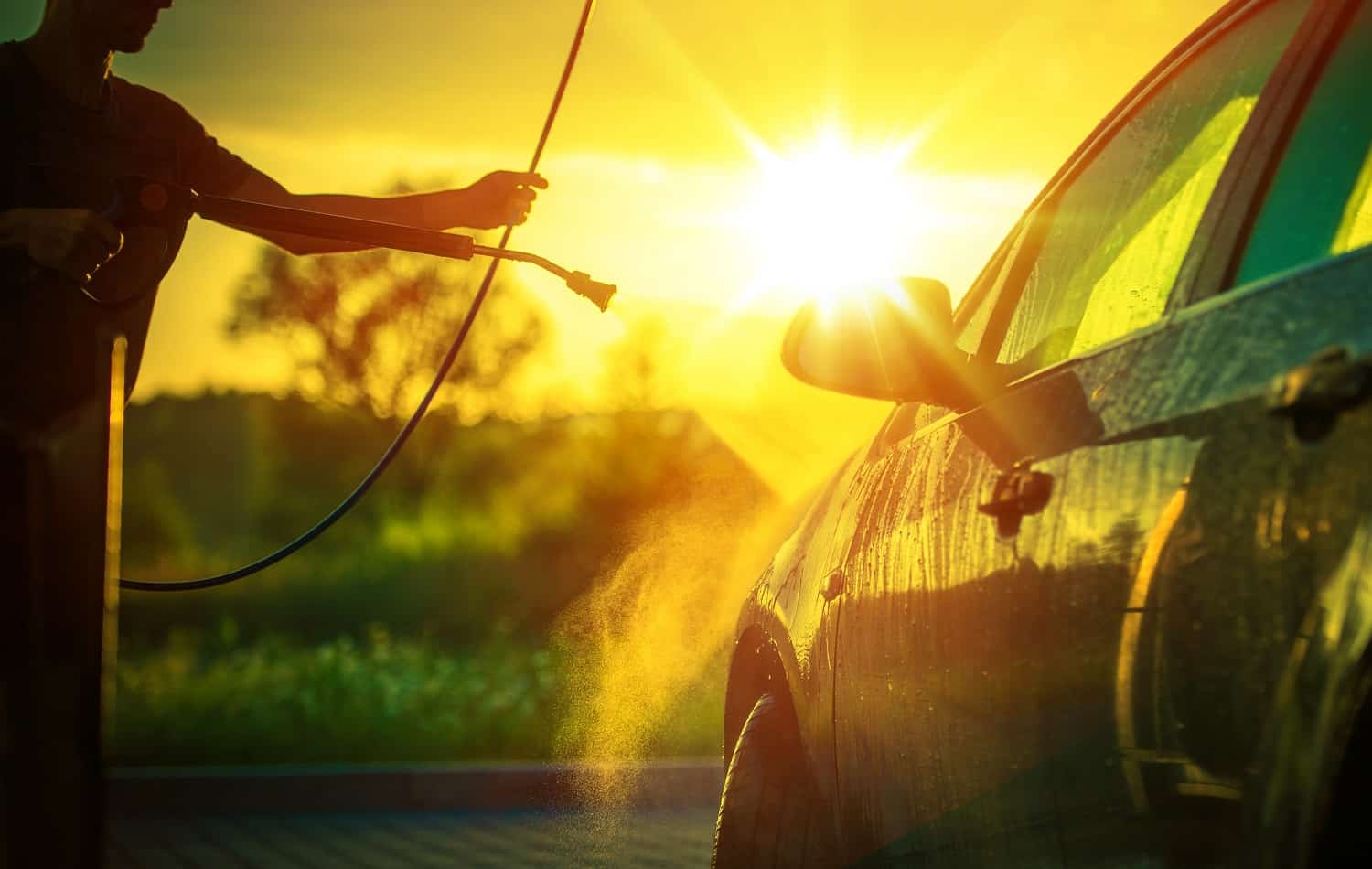 Spring Car Washing During Sunset. High Pressure Water Washing System. Excell Pressure Washer Review