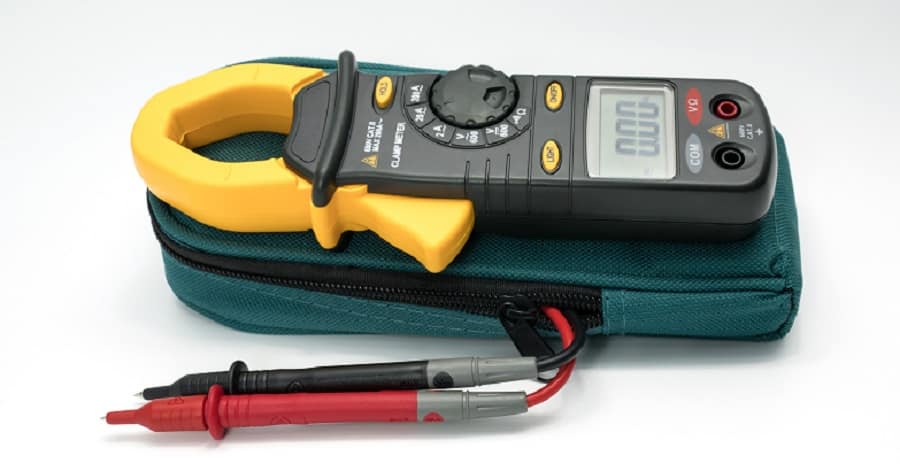 Digital clamp meter with probes on white background