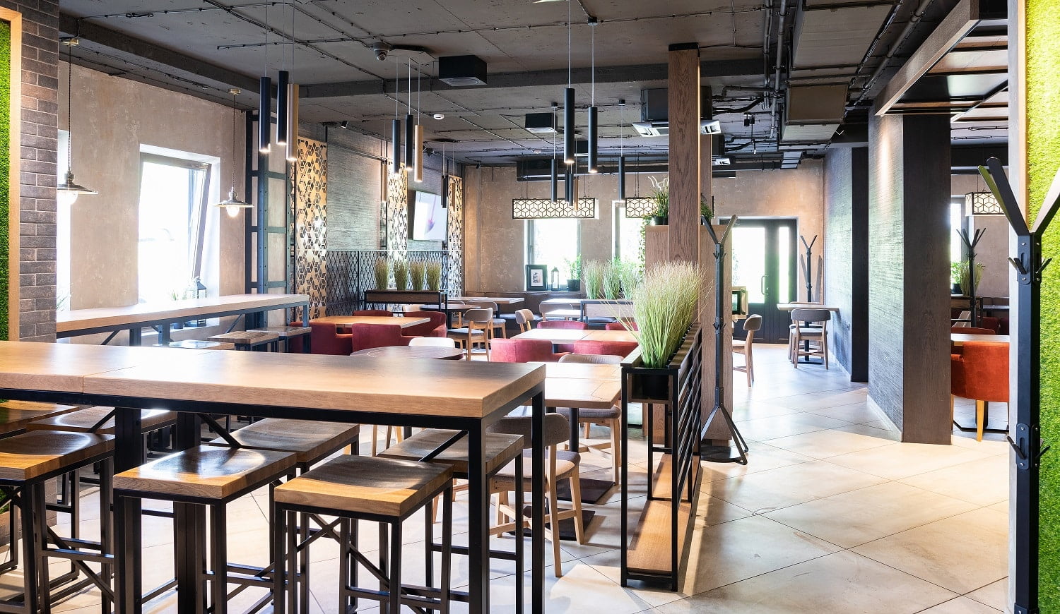 Main hall in the new modern restaurant in freshh green style with exquisite modern furniture